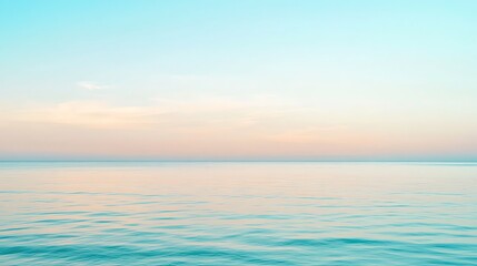 Obraz premium A soft, blurred gradient background in pastel shades of blue, green, yellow, and pink.