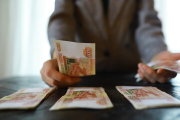 Banknotes with inscription "five thousand rubles". Russian money face value of five thousand rubles. Close-up of Russian rubles . The concept of Finance.Background and texture of money