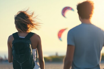 Couple enjoying kitesurfing at sunset on a beach with colorful kites in the background