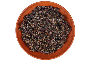 Cooked black quinoa in clay bowl isolated on a white background.Top view