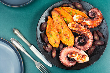 A dish with roasted octopus tentacles.