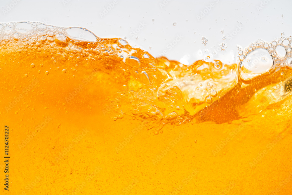 Wall mural Close up bright orange Oil or beer splash texture and nature waves, Beautiful waves curve and little bubbles smooth for graphic design and background, Oil Bubbles, Soft beer bubbles, Selective focus