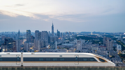 High-Speed Train Gliding Through Urban Skyline at Dusk