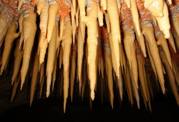 Detailed View Of Stalactites Formed In Cave Interiors