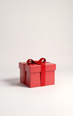 Obraz premium A minimalist 3D rendered image of a red gift box displayed in an exhibition booth on a white background with subtle shadow._00001_