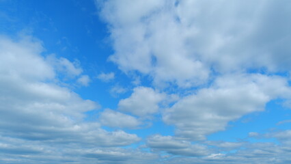 Summer clouds. Puffy fluffy white clouds. Time lapse.