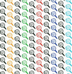 The colored round figures with handles imitate either lollipops or magnifying glasses.