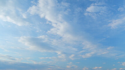 Blue heaven summer cloudscape. Rolling puffy white layered clouds are moving. Time lapse.