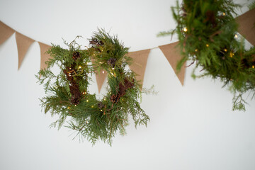 New Year's wreaths and craft flags on a white background. New Year and Christmas, decorations