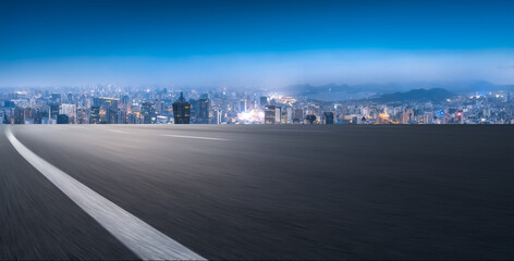 Dynamic Urban Landscape: A Highway Leading to a Vibrant City Skyline