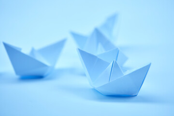 paper boats on the documents