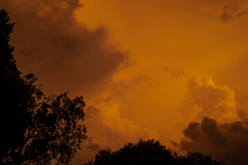 Orange cloudscape over the Highveld of South Africa caused by the Rayleigh scattering phenomenon