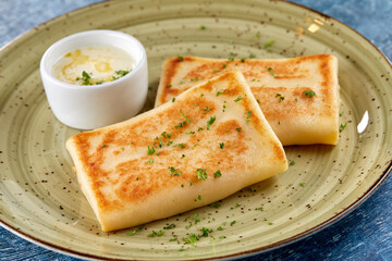 pancakes with sour cream and herbs