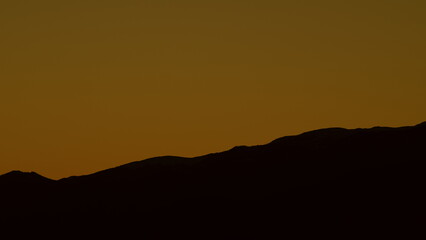 Landscape Of Sunrise Over Mountains. Fragment Of Ridge With Sky.