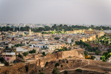 Aerial panoramic cityscape of Fez, Fès, Fes, Morocco at sunset.