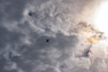 Silhouette of drone in sky