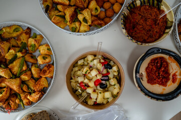 Buffet Table with Appetizers, Salads, and Dips