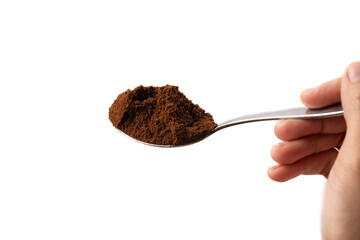 A spoonful of fine coffee powder, isolated on white background