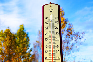 Thermometer for measuring outdoor air temperature. Cold weather in winter season. Meteorological...