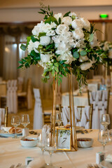 Elegant White Flower Centerpiece at Wedding Reception