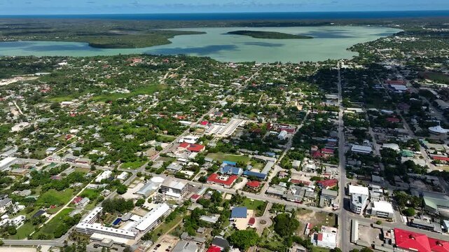 Drone flight over Nuku'alofa, the capital of the Kingdom of Tonga. The building of the royal residence and the sights of the town of Nuku'alofa. Panorama of Tongatapu Island. Cityscape from a bird's e