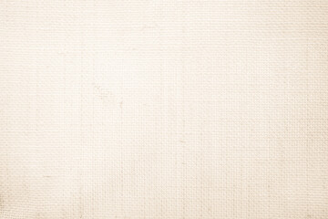 Closeup detail of beige fabric texture background. High resolution photo.