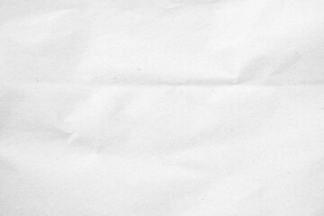 White recycled craft paper texture as background. Grey paper texture, Old vintage page or grunge vignette of old newspaper. Pattern rough art creased grunge letter. Hardboard with copy space for text.