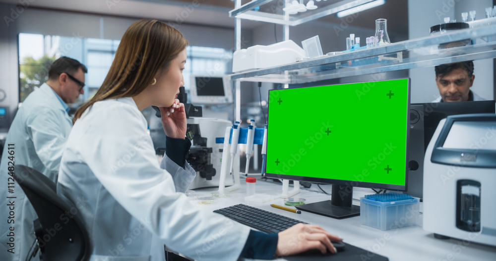 Poster medical research and development laboratory: beautiful asian female scientist working on a computer 