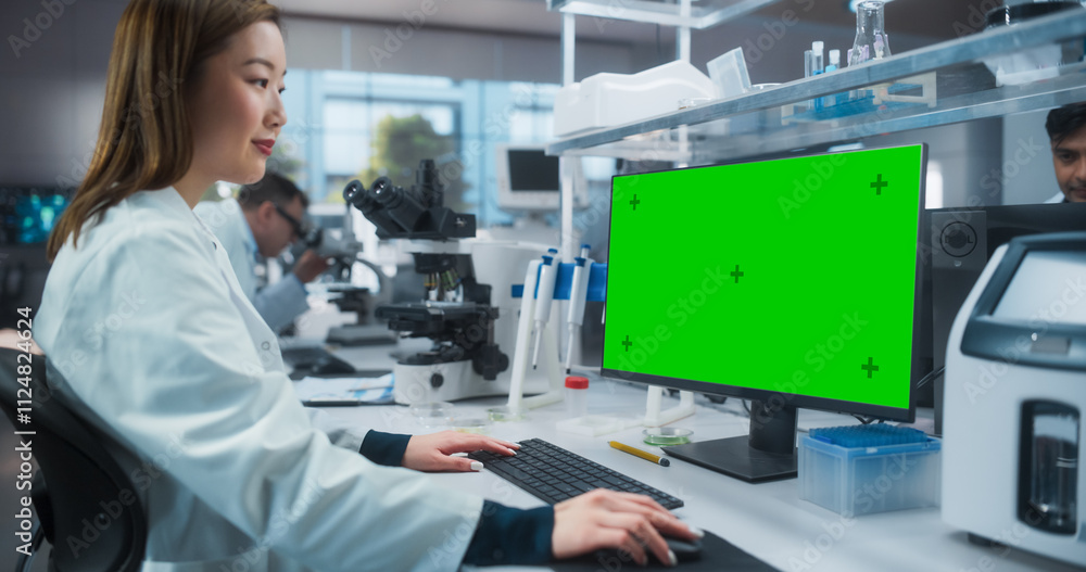 Poster medical research and development laboratory: beautiful asian female scientist working on a computer 