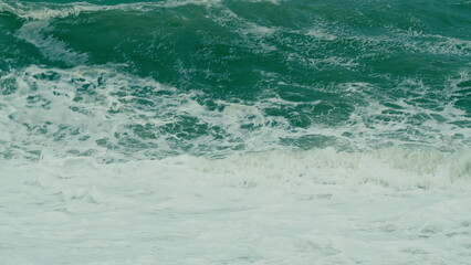 Obraz premium Breaking Surf With Foam In Ocean. Big Sea Or Ocean Surf Wave Crashing. Bad Weather Cyclone Hurricane Winds.