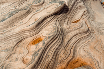 Natural rock patterns and textures on coastal rocks