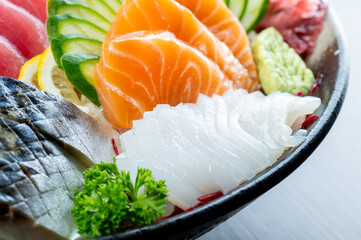 sashimi mixed fresh set japanese food variation in dish. Sashimi Japanese food, Sashimi set with wasabi, fish, shrimp in plate of Assorted. fresh slide mix fish set on ice menu in restaurant