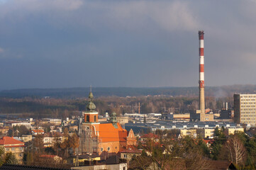 Fototapeta premium Townscape in a light haze. Chełmek, Poland.