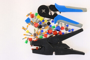 A tool for installing equipment in an electrical switchboard. Soft focus. Close-up.