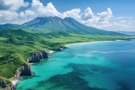 Turquoise sea washing lush coastline of volcanic island in kunashir island