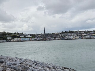 City Skyline Overlooking Lake and Cloudy Sky