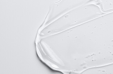 The texture of a cosmetic serum for the face with hyaluronic acid and collagen. Copy space