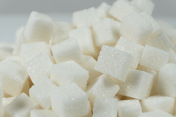 Cubes of white crystalline beetroot refined sugar.