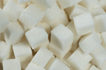 Cubes of white crystalline beetroot refined sugar.