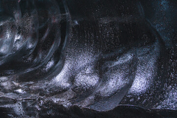 Detailed, close-Up Of Ice In An Ice Cave. Blue pattern, texture. Southern Iceland. Copy space for text or background.