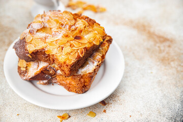 Brioche sweet almond french toast fresh tasty food dish delicious gourmet food background on the...