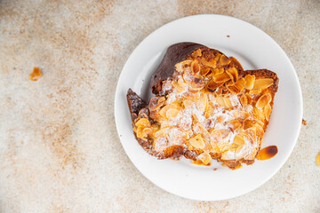 Brioche sweet almond french toast fresh tasty food dish delicious gourmet food background on the table rustic food top view copy space