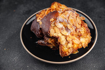 Brioche sweet almond french toast fresh tasty food dish delicious gourmet food background on the table rustic food top view copy space