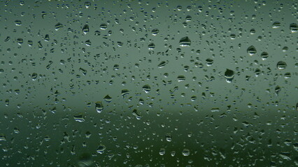 Raindrops On The Window. Water Drops Descend On The Window In Rainy Weather. Pan.