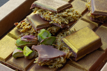  Gold-dusted  Dubai chocolate bar with pistachio layers