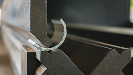 Metal stainless sheet bending on hydraulic machine.  bending stainless sheet. 