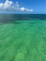 Concrete breakwater on the beach with a red heart painted on it