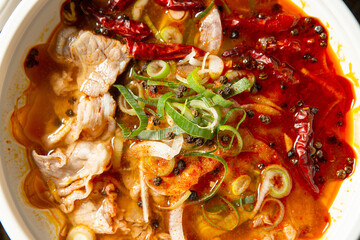 Malatang,  skewered vegetables and meat cooked in a hot and spicy soup