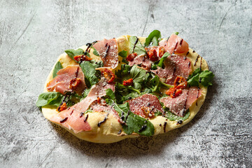 Smoked Prosciutto and Arugula Pizza