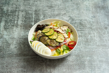 Zucchini and mushroom vegetable salad in a bowl	